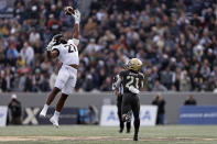 Wake Forest linebacker Chase Jones, left, breaks up a pass intended for Army running back Tyrell Robinson (21) during the first half of an NCAA college football game Saturday, Oct. 23, 2021, in West Point, N.Y. (AP Photo/Adam Hunger)