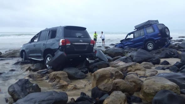 Sucked in: The Australian beach that 'swallows' cars