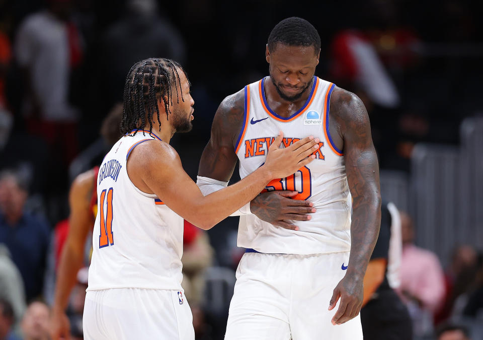 ATLANTA, GEORGIA - OCTOBER 27: Julius Randle #30 of the New York Knicks reacts with Jalen Brunson #11 after grabbing a rebound and drawing a foul in the final seconds of the fourth quarter against the Atlanta Hawks at State Farm Arena on October 27, 2023 in Atlanta, Georgia. NOTE TO USER: User expressly acknowledges and agrees that, by downloading and/or using this photograph, user is consenting to the terms and conditions of the Getty Images License Agreement. (Photo by Kevin C. Cox/Getty Images)