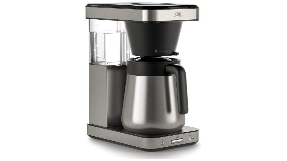An OXO Brew 8 Cup coffee maker against a transparent background