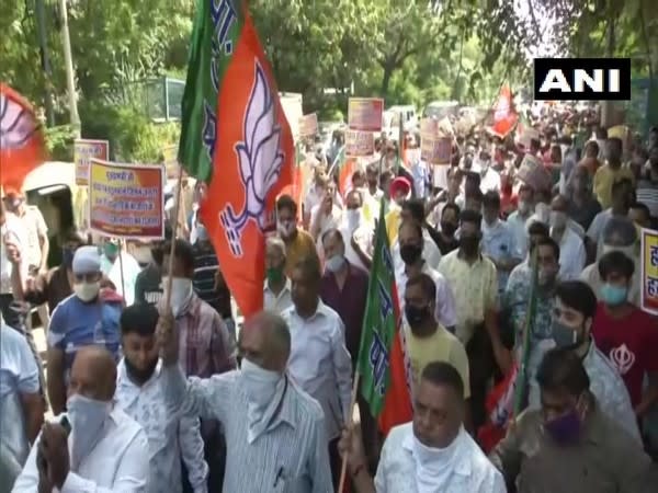 BJP workers protest in national capital. (Photo/ANI)