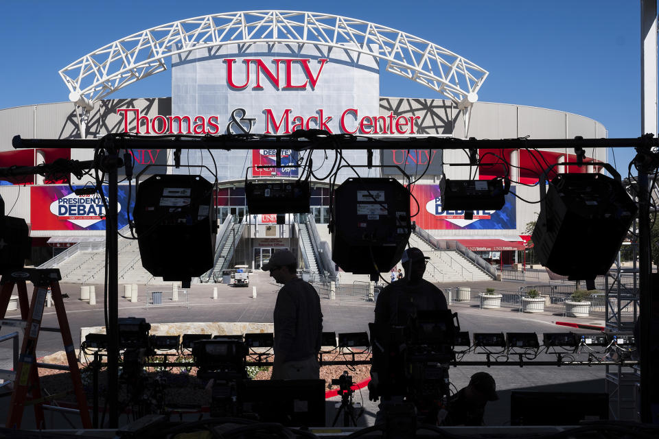 Television crews set up outside of the presidential debate site at the University of Nevada, Las Vegas on Oct. 17, 2016, as preparations continue for the final debate between Republican presidential nominee Donald Trump and Democratic presidential nominee Hillary Clinton. (Photo: J. David Ake/AP)