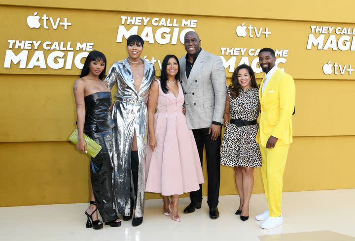 From left: Elisa Johnson, EJ Johnson, Cookie Johnson, Magic Johnson, Lisa Johnson and Andre Johnson attend the Los Angeles premiere of Apple's "They Call Me Magic" in 2022.