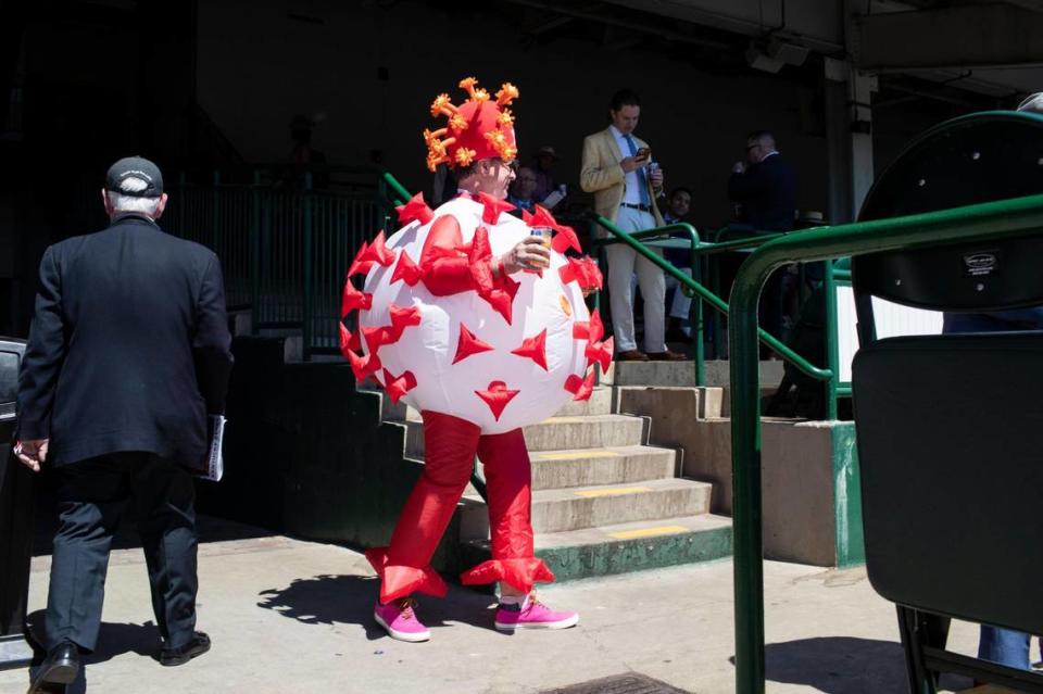 Mark Ferguson, of Dallas, wore a virus costume for Derby day.