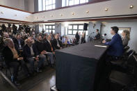 San Francisco Giants catcher Buster Posey and his wife, Kristen, talk to the media announcing his retirement from baseball, Thursday, Nov. 4, 2021, in San Francisco. He is retiring after 12 years in Major League Baseball. (AP Photo/Tony Avelar)