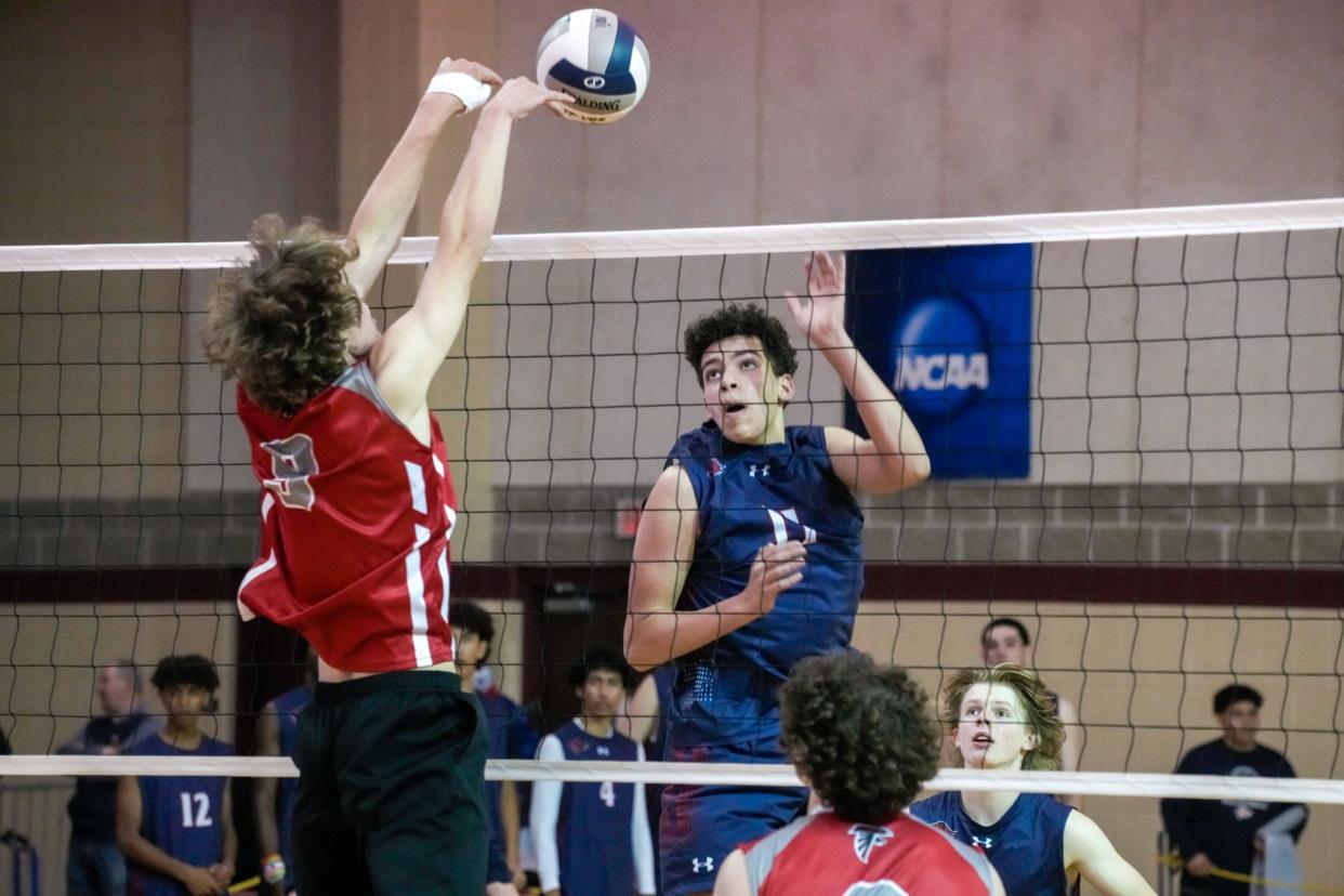 Lincoln's Austin Noel goes up against Christopher Harvey's touch shot.
Division II title Cranston West vs. Lincoln