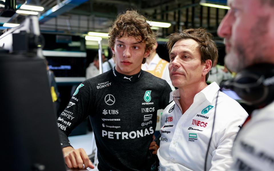 Andrea Kimi Antonelli, junior driver of Mercedes AMG F1 Team, and Team Principal Toto Wolff during practice for the Monza Grand Prix, August 30  2024