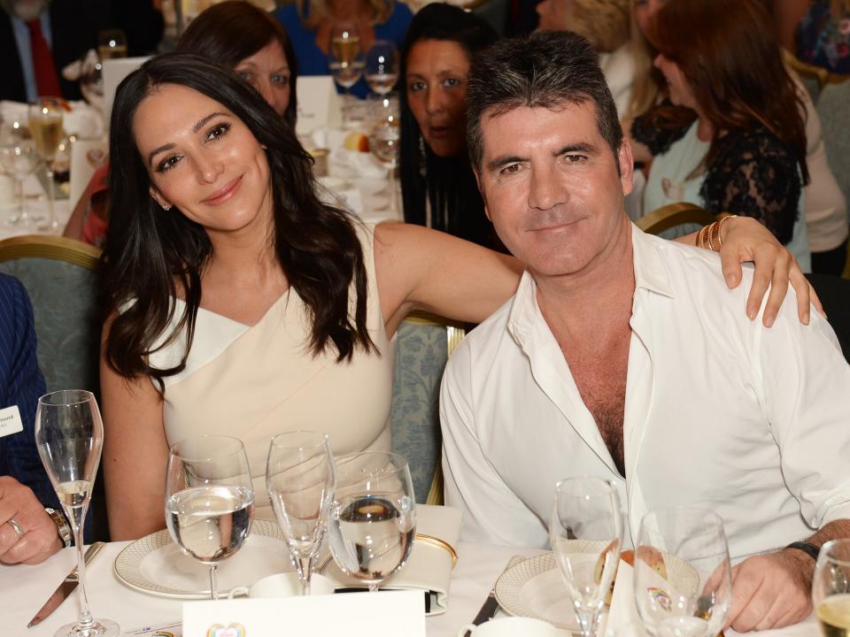 Lauren Silverman and Simon Cowell attend the Health Lottery Tea Party at The Savoy on June 2, 2014 in London, England