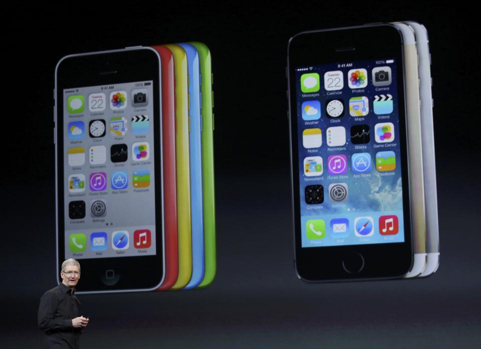 Apple Inc CEO Tim Cook speaks on stage during an Apple event in San Francisco