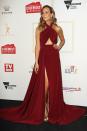 <p>The Project host and Logie nominee Carrie Bickmore stunned on the night in a Paolo Sebastian deep red gown, which showed off her taut stomach and featured a daring thigh-high split.</p>