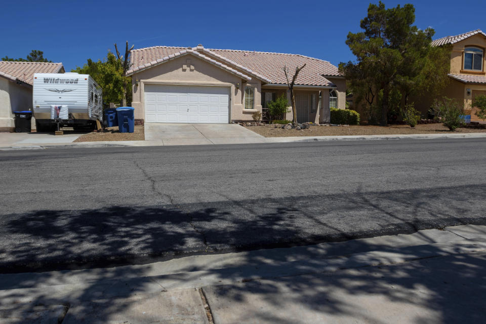 A home searched by Las Vegas police is seen on Thursday, July 20, 2023, in neighboring Henderson, Nev. The property was searched Monday, July 17, in connection with the 1996 drive-by shooting of rapper Tupac Shakur in Las Vegas. (AP Photo/Ty ONeil)