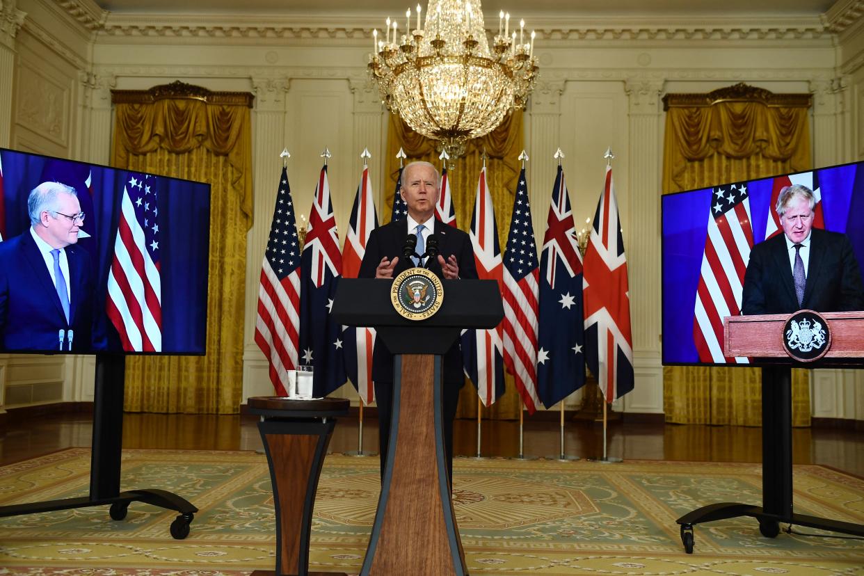 US President Joe Biden participates is a virtual press conference on national security with British Prime Minister Boris Johnson (R) and Australian Prime Minister Scott Morrison in the East Room of the White House in Washington, DC, on September 15, 2021. (Photo by Brendan Smialowski / AFP) (Photo by BRENDAN SMIALOWSKI/AFP via Getty Images)