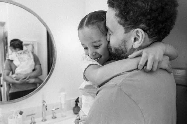 <p>Tommy Oliver</p> Michael Ealy with his daughter Harlem