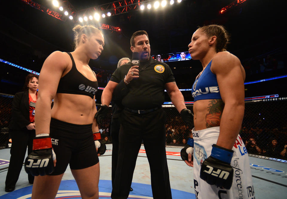 ANAHEIM, CA - FEBRUARY 23:  (L-R) Opponents Ronda Rousey and Liz Carmouche face off before their women's bantamweight title fight during UFC 157 at Honda Center on February 23, 2013 in Anaheim, California.  (Photo by Donald Miralle/Zuffa LLC/Zuffa LLC via Getty Images)