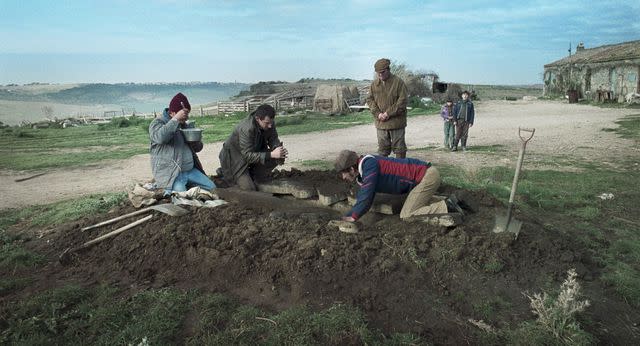 <p>NEON</p> Josh O'Connor and fellow cast members searching for a buried tomb in 'La Chimera'