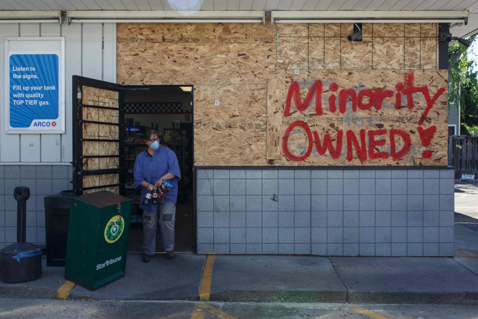 A store is boarded up as local businesses prepare themselves from violent demonstrations in Minneapolis, Minn. on May 30, 2020. | Kerem Yucel—AFP/Getty Images—AFP or licensors