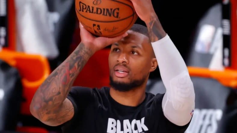 Damian Lillard is leaving the Portland Trail Blazers for the Milwaukee Bucks. Above, the seven-time all-NBA player warms up in 2020 before Portland’s Game Four against the Los Angeles Lakers in the Western Conference First Round of the NBA Playoffs. (Photo: Kevin C. Cox/Getty Images)