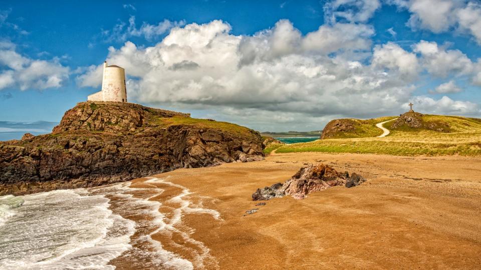 Ynys Llanddwyn is a small tidal island at one end of Newborough Beach (Getty Images/iStockphoto)