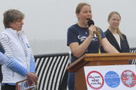 Blair Nelsen, executive director of the Waterspirit environmental group, speaks at a press conference in Keyport N.J., on Monday, May 6, 2024, to celebrate the cancellation of a natural gas pipeline project that would have run through the bay en route to New York City. But a different project to carry liquefied natural gas through Pennsylvania and New Jersey for export to other nations is moving forward. (AP Photo/Wayne Parry)