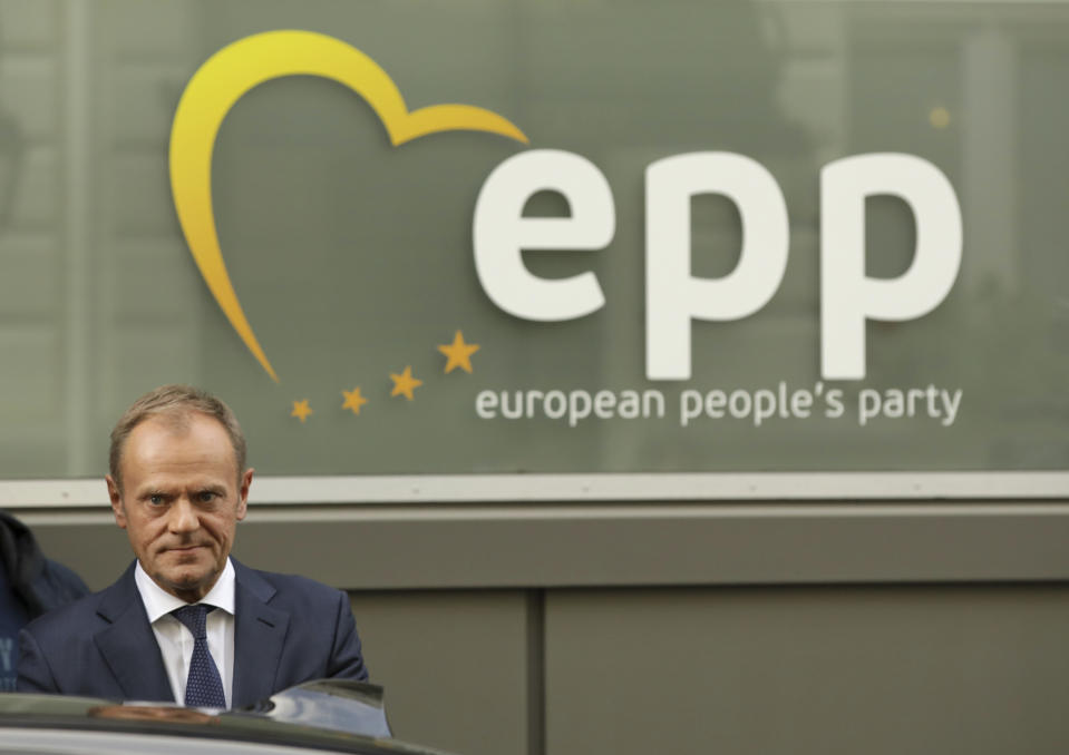 Donald Tusk, President of the European Council, leaves a meeting of the European People's Party EPP in Brussels, Belgium, Wednesday, Oct. 17, 2018 when European leaders meet to negotiate on terms of Britain's divorce from the European Union. (AP Photo/Olivier Matthys)