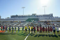 The women's teams for Norway and the U.S. take the field for a match at the Homeless World Cup, Tuesday, July 11, 2023, in Sacramento, Calif. Thirty countries are competing in the games with teams that include people who have lived on the streets to refugees to foster children. (AP Photo/Godofredo A. Vásquez)