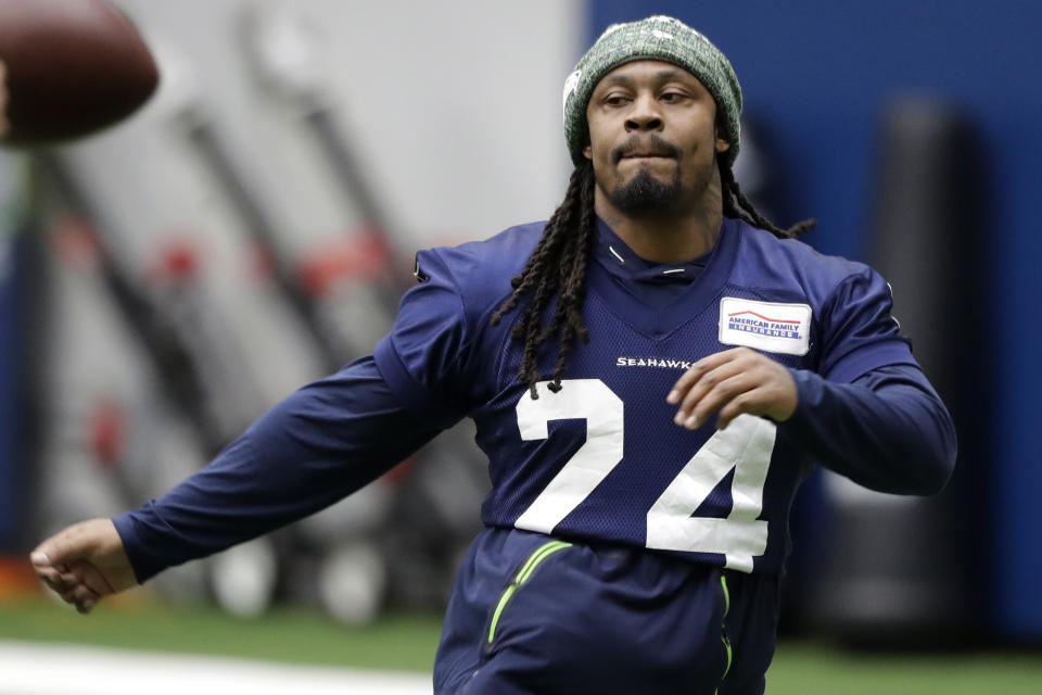 Seattle Seahawks running back Marshawn Lynch warms up for NFL football practice, Friday, Dec. 27, 2019, in Renton, Wash. (AP Photo/Ted S. Warren)