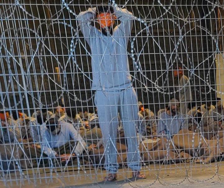 <span>Prisoners are detained in cages, blindfolded and handcuffed, one of the whistleblowers said.</span><span>Photograph: supplied</span>