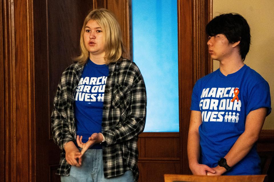 Left: Lauren Wessling, Johnston High School senior, speaks during a March for Our Lives vigil for gun violence victims at the Iowa State Capitol on Saturday, Jan. 27, 2024, in Des Moines.