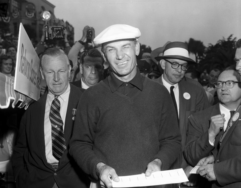 (Original Caption) Golfer Ben Hogan gives a knowing wink after he learned his score of 287 was tops at the end of his 72 holes in the USGA Open Tournament at San Francisco, June 18. Both Hogan's eyes opened wide an hour and a half later when unheralded pro Jack Fleck of Davenport, Iowa, sank a seven-foot putt on the 18th green to duplicate Hogan's score and throw the match into a playoff. Next day, Fleck carded a one-under-par 69 in the 18-hole playoff to beat Hogan's 72 and score a Cinderella victory in the Open match. Hogan announced he would retire.