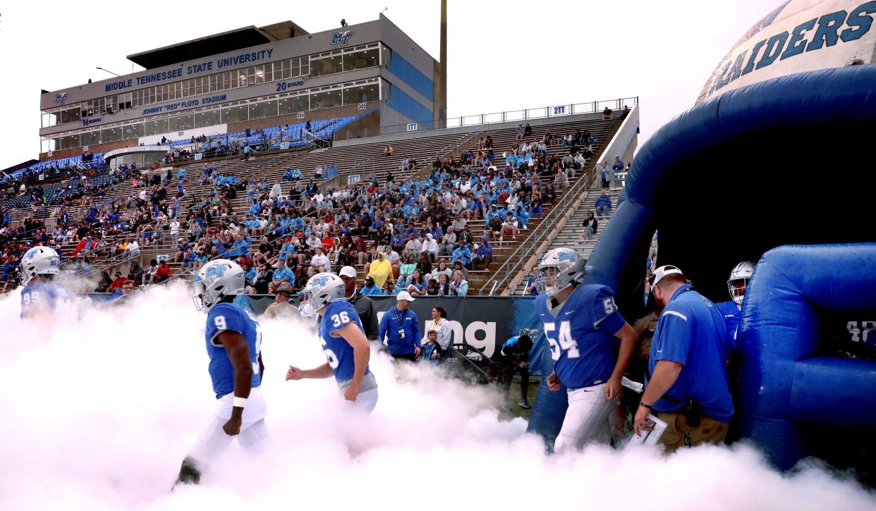 MTSU players run onto the field before the start of the game against Murray State during at MTSU's Floyd Stadium on Saturday, Sept. 16, 2023.