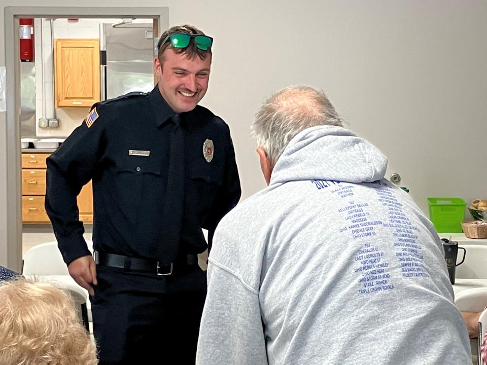 Johnsville Firefighter Bailey Dretzka shares a laugh with Tom Moyer.