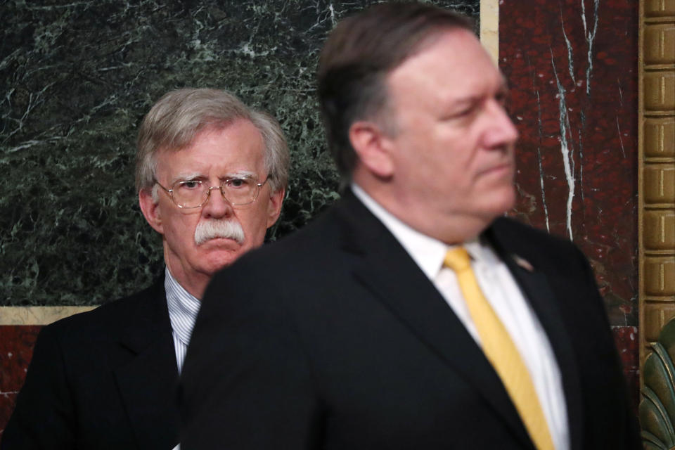 National security adviser John Bolton, left, and Secretary of State Mike Pompeo in 2018.