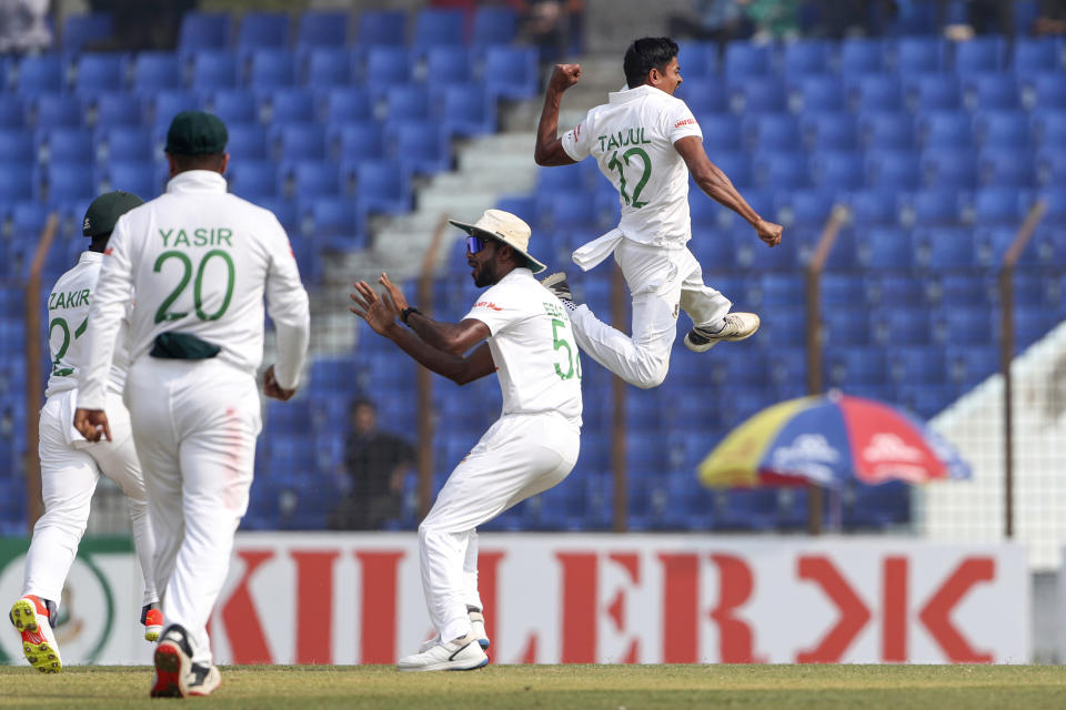 Bangladesh's Taijul Islam celebrates the wicket of India's Virat Kohli during the first day of the first test cricket match between Bangladesh and India in Chattogram, Bangladesh, Wednesday, Dec. 14, 2022. (AP Photo/Surjeet Yadav)