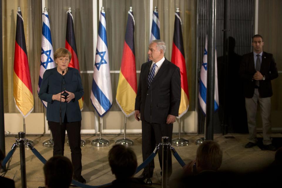 Germany's Chancellor Angela Merkel, gestures as she speaks during her meeting with Israeli Prime Minister Benjamin Netanyahu at the Prime minister's residence in Jerusalem, Monday, Feb. 24, 2014. (AP Photo/Sebastian Scheiner)