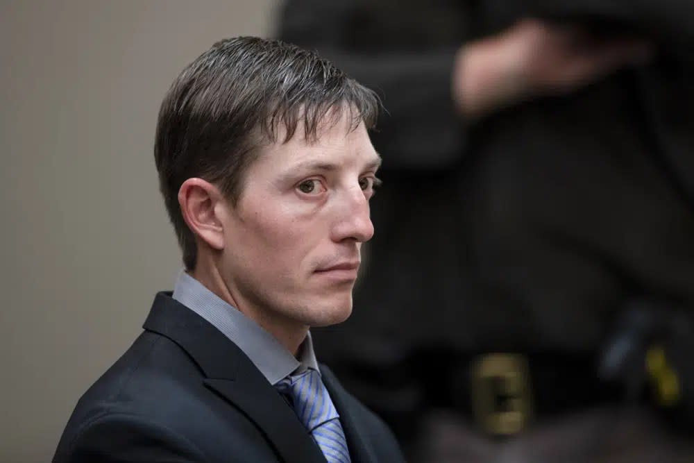 Ex-Grand Rapids Police Officer Christopher Schurr appears for a court hearing at the Kent County Courthouse in Grand Rapids, Mich., Oct. 26, 2022. (Cory Morse/The Grand Rapids Press via AP, File)