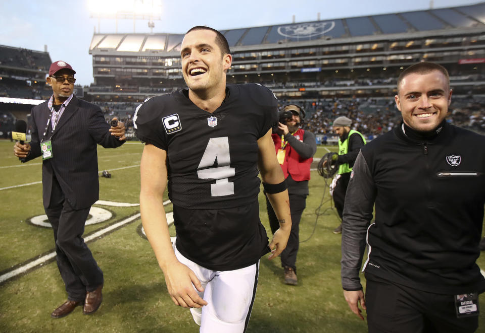 For Derek Carr and the Raiders smiles have rarely cracked. Can the passed over QB bring similar happiness to fantasy owners in Week 15? (AP Photo/Ben Margot)