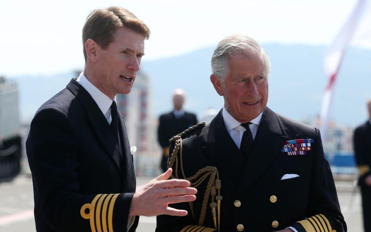 The Prince of Wales with Nick Cooke-Priest, captain of the largest and most powerful ship built for the Royal Navy  - PA