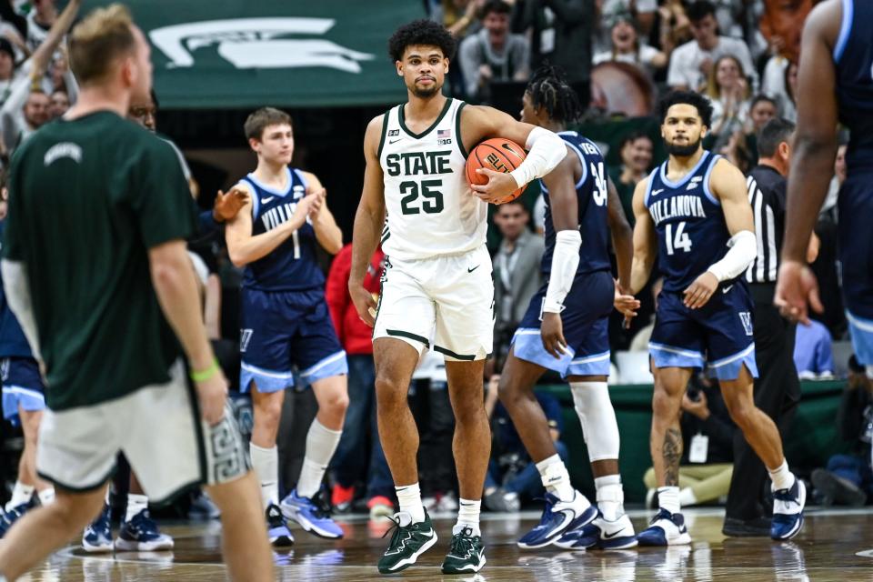 Malik Hall, here holding onto the ball as the buzzer sounded on MSU's win over Villanova, will be out for several weeks with a foot injury.