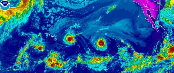 Hurricanes Madeline (left) and Lester (right) swirl across the Central Pacific Ocean on Tuesday August 30, 2016.