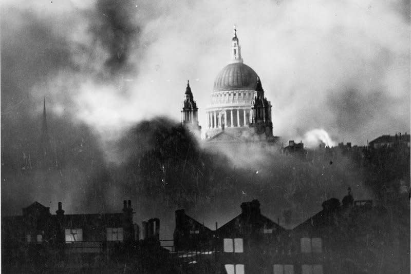 St. Paul's Cathedral is surrounded by smoke during the German bombing of London on December 29, 1940, as part of World War II. File Photo courtesy the Imperial War Museum
