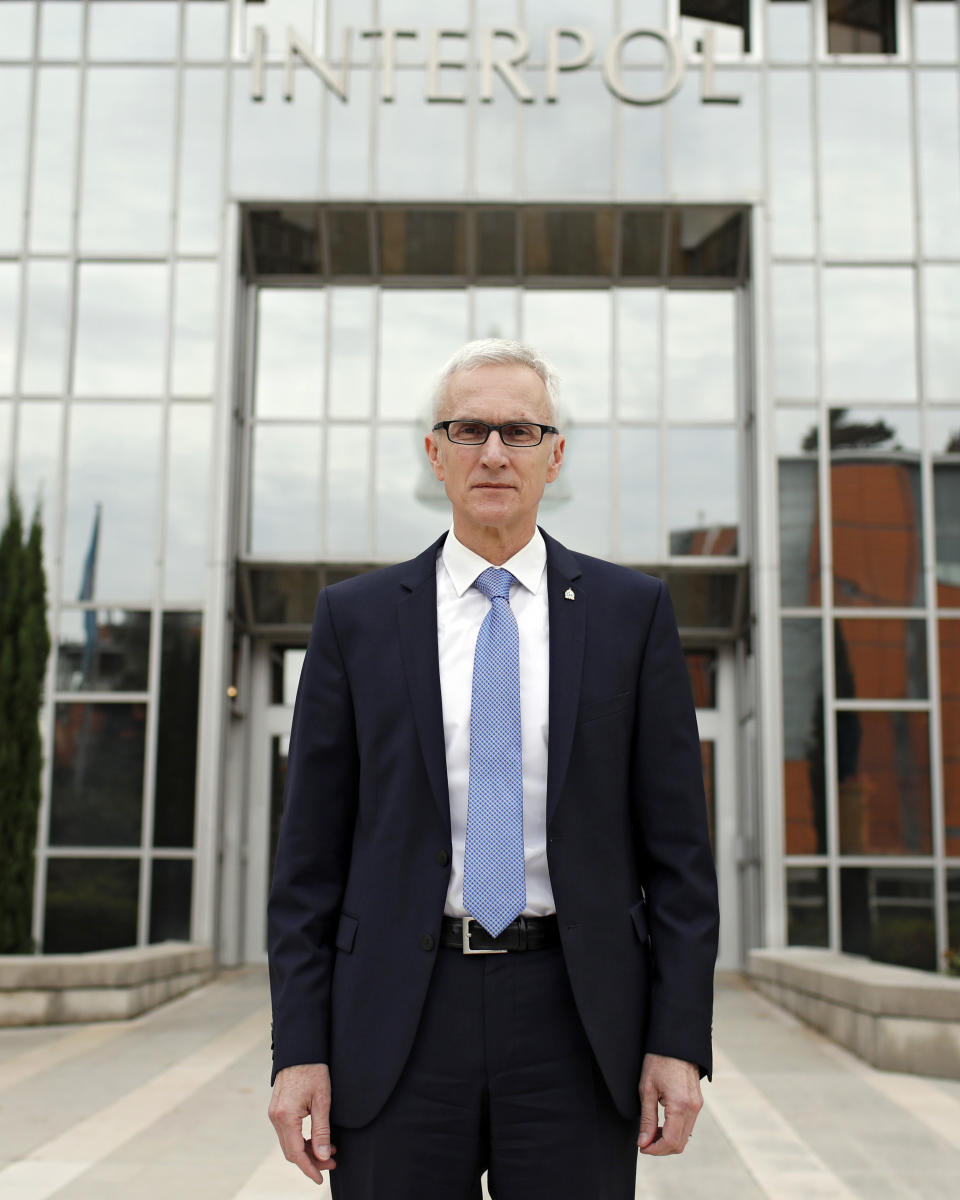 Interpol Secretary General Jurgen Stock poses a the international police agency in Lyon, central France, Thursday, Nov.8, 2018. (AP Photo/Laurent Cipriani)