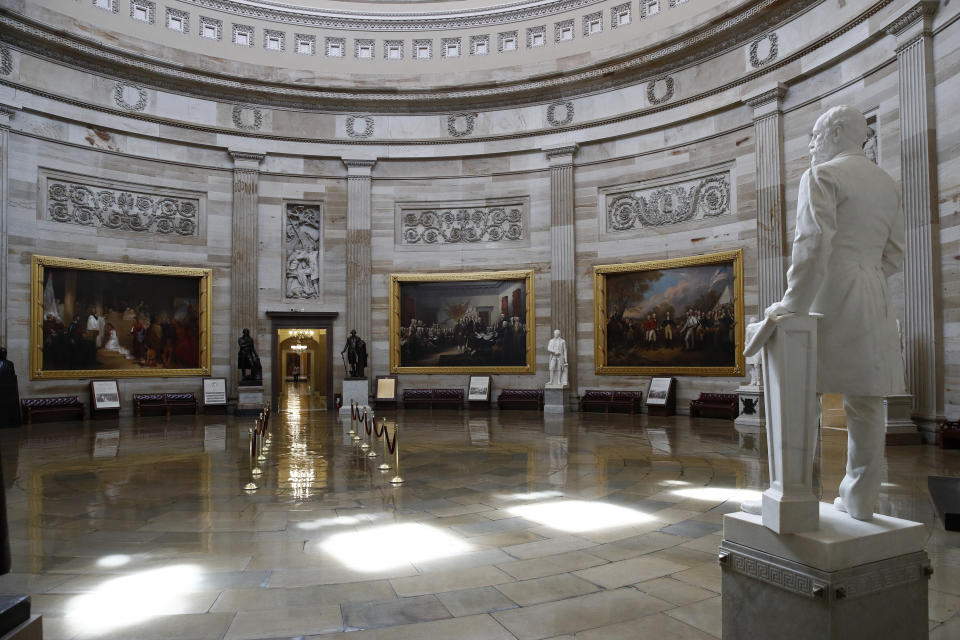 The U.S. Capitol Rotunda sits empty on Capitol Hill in Washington, Monday, March 16, 2020. Congress has shut the Capitol and all Senate and House office buildings to the public until April in reaction to the spread of the coronavirus outbreak. (AP Photo/Patrick Semansky)