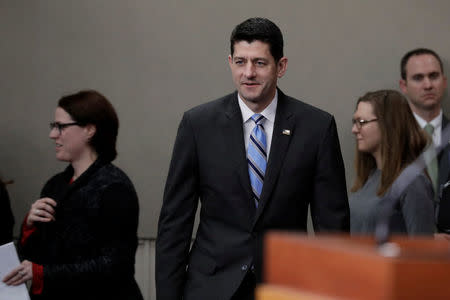 House Speaker Paul Ryan (R-WI) arrives at a news conference with Republican leaders after their closed conference on Capitol Hill in Washington, U.S., February 14, 2018. REUTERS/Yuri Gripas