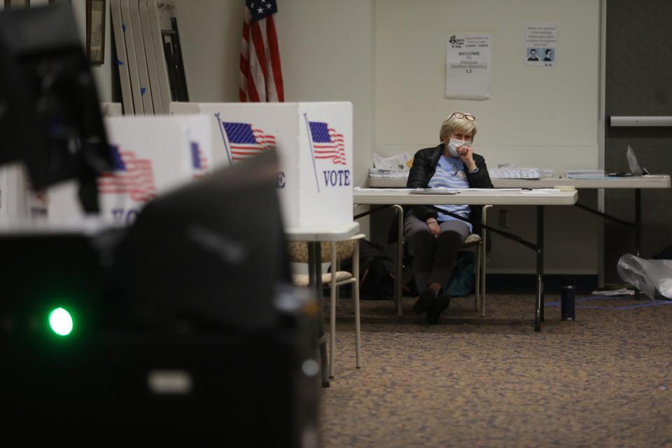 A poll worker in Pittsford in 2020.