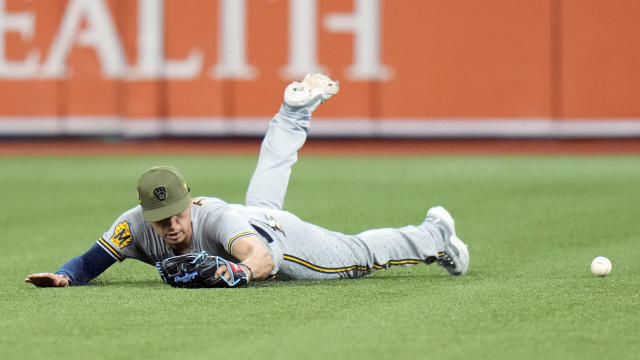 Milwaukee Brewers right fielder Tyrone Taylor can't make the catch on a single by Tampa Bay Rays' Josh Lowe during the eighth inning of a baseball game Friday, May 19, 2023, in St. Petersburg, Fla. (AP Photo/Chris O'Meara)