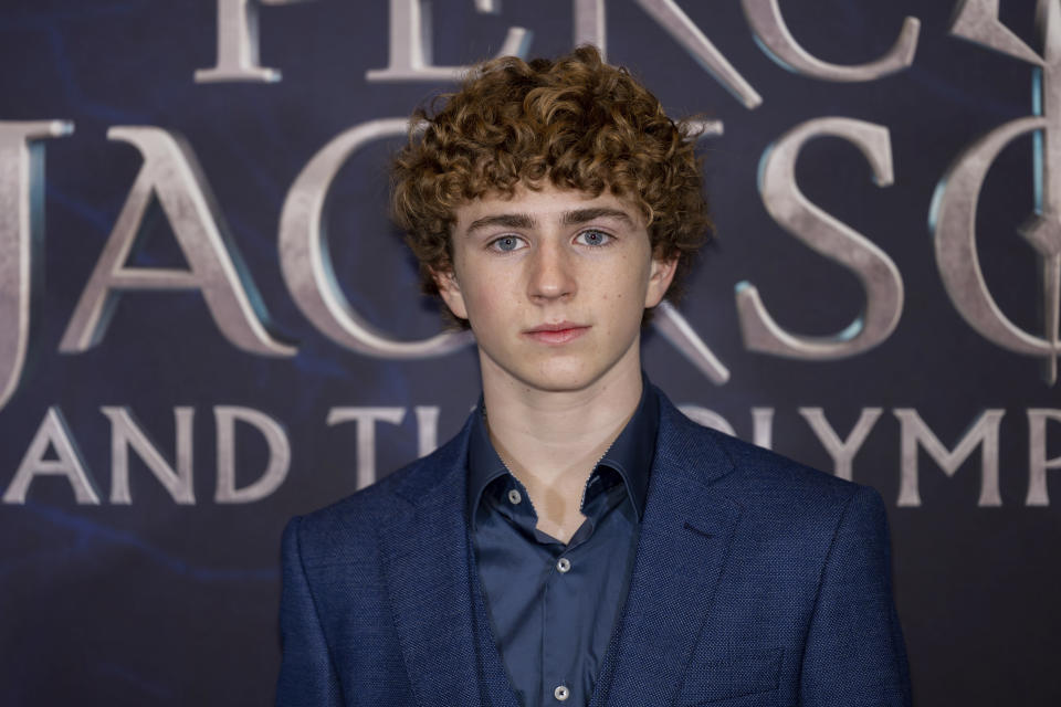 Walker Scobell poses for photographers upon arrival at the premiere of the television series 'Percy Jackson and the Olympians' in London Saturday, Dec. 16, 2023. (Photo by Vianney Le Caer/Invision/AP)