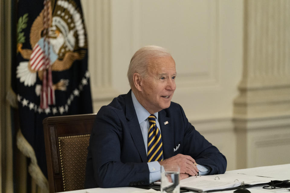 President Joe Biden speaks during a virtual meeting with Indian Prime Minister Narendra Modi, Australian Prime Minister Scott Morrison and Japanese Prime Minister Yoshihide Suga, from the State Dining Room of the White House, Friday, March 12, 2021, in Washington. (AP Photo/Alex Brandon)