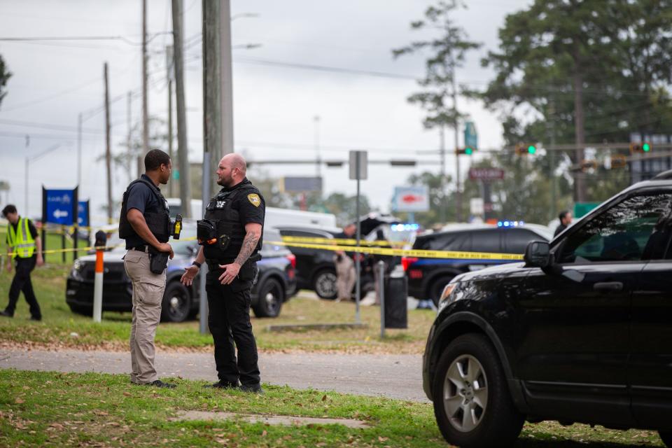 Tallahassee Police officers work the scene of a shooting that occurred on North Monroe Street on Friday afternoon, March 8, 2024.