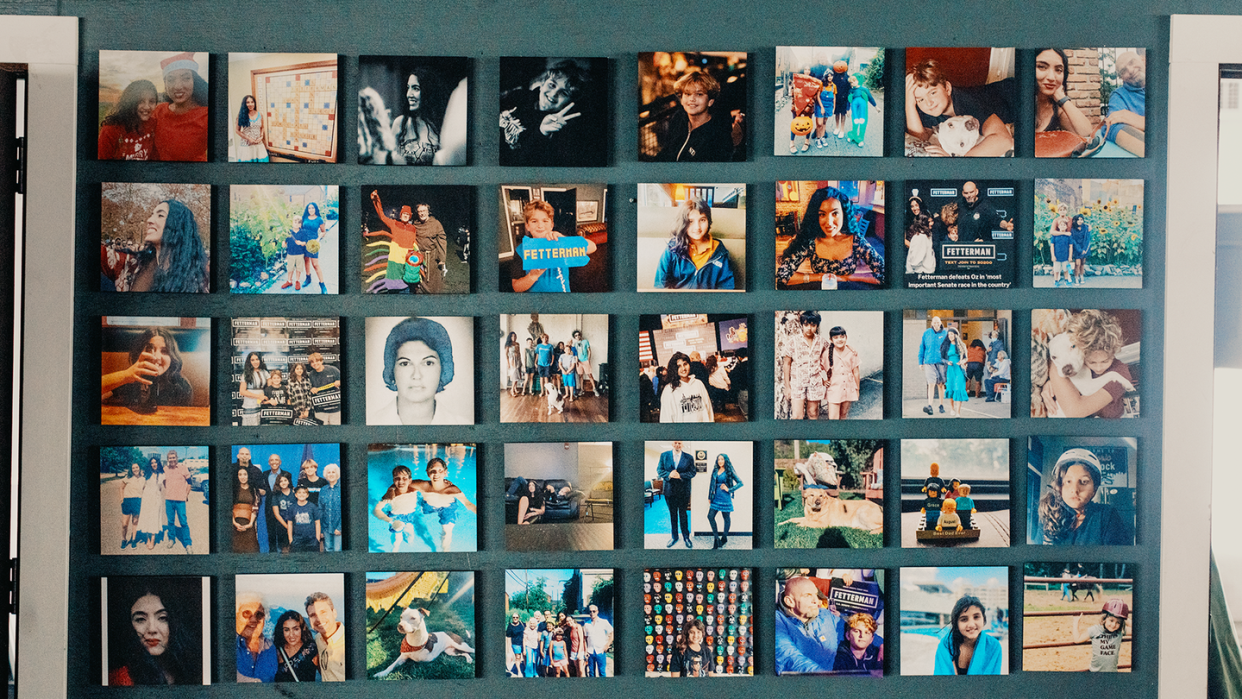 a wall of family photos inside the fetterman home