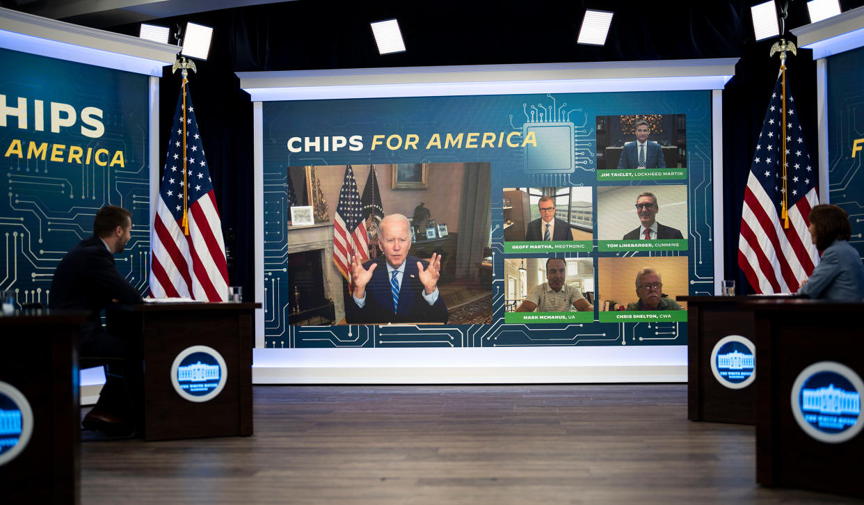 President Joe Biden is seen on a screen during a meeting with business leaders to discuss the CHIPS Act, at the White House in Washington, D.C. on July 25, 2022.